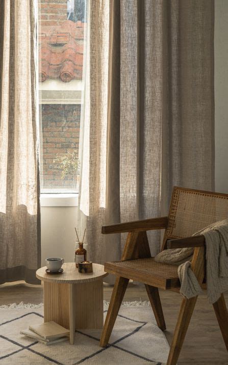 A Chair And Table In Front Of A Window