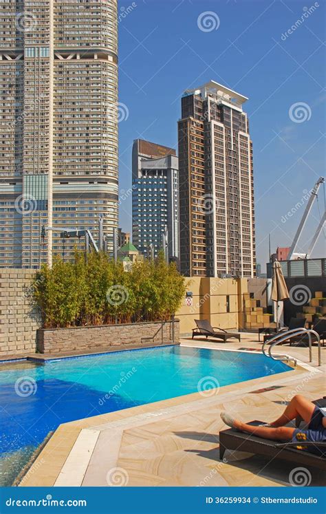 Enjoying Hotel Rooftop Swimming Pool Stock Photo - Image of barrier, glass: 36259934