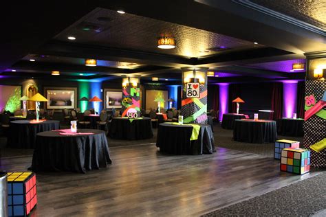 80 s theme décor include rubix cubes pacman I love the 80 s uplights