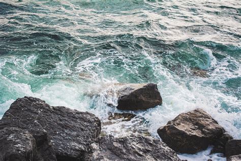 Sea Waves Breaking against Rocks · Free Stock Photo