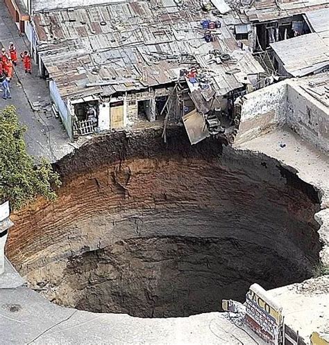 Stunning Sinkhole Devours Homes in Guatemala City