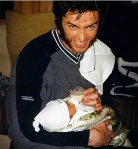 Wolverine feeding his offspring in his natural habitat. : r/pics