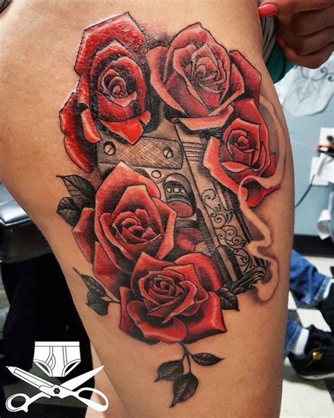 Guns And Roses Thigh Tattoo