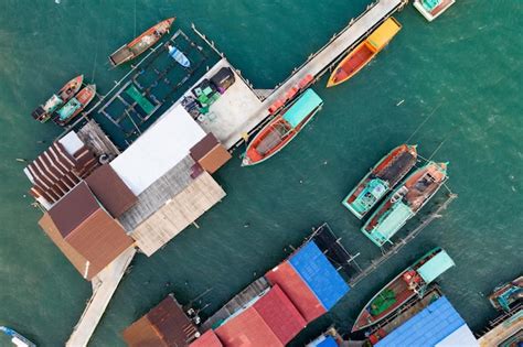 Premium Photo High Angle View Of Commercial Dock By Sea