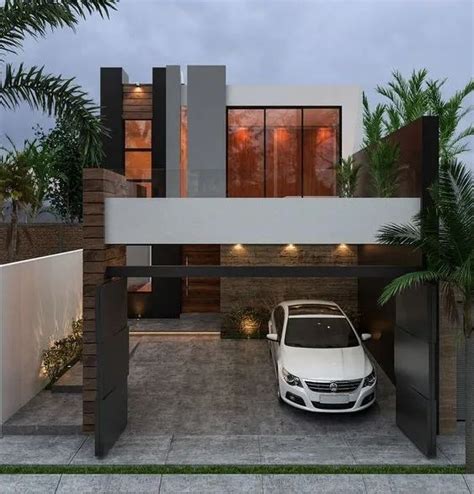 A White Car Is Parked In Front Of A Modern House