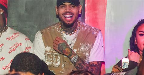 Chris Brown Proposes To A Fan During Meet And Greet