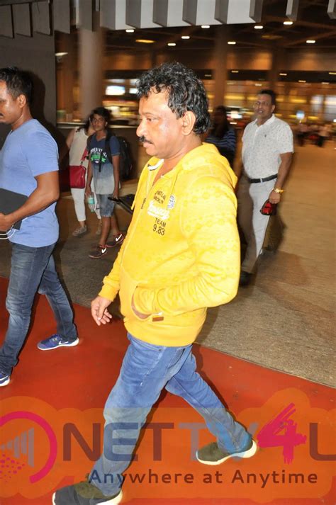 Director Ram Gopal Varma Spotted At Airport Extraordinary Photos