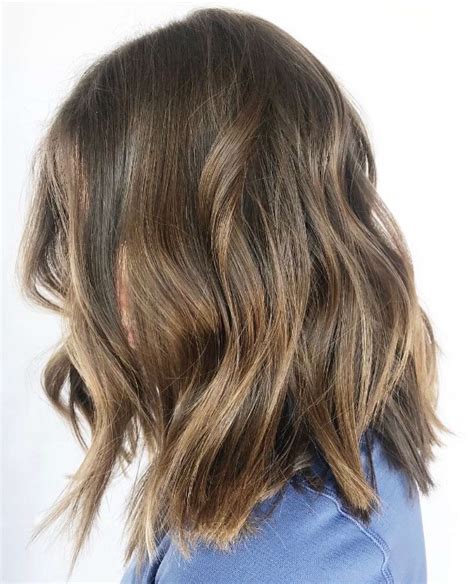 flattering mid length brown haircuts    year