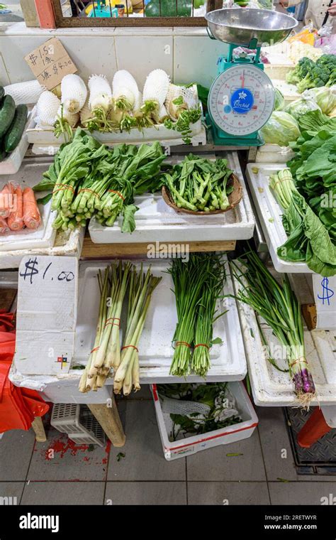 Fresh Vegetables On Display At A Stall At The Chinatown Complex Wet