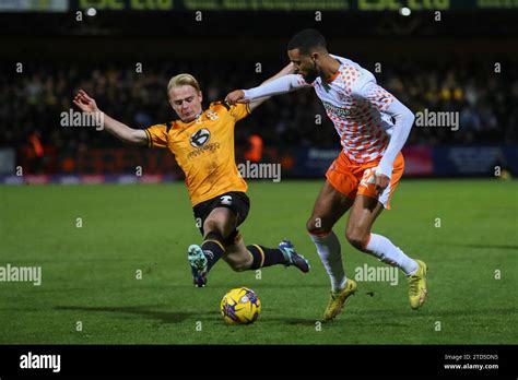 Liam Bennett 2 Of Cambridge United Tackles Cj Hamilton 22 Of