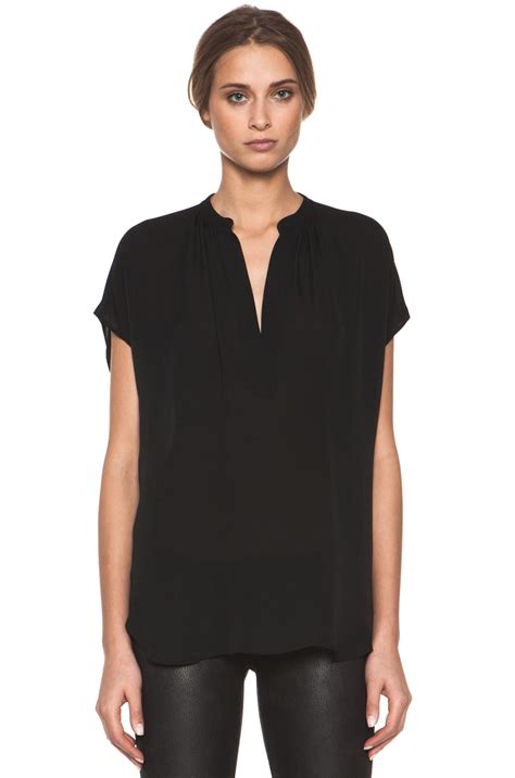 Vince Cap Sleeve Popover Blouse In Black Fwrd