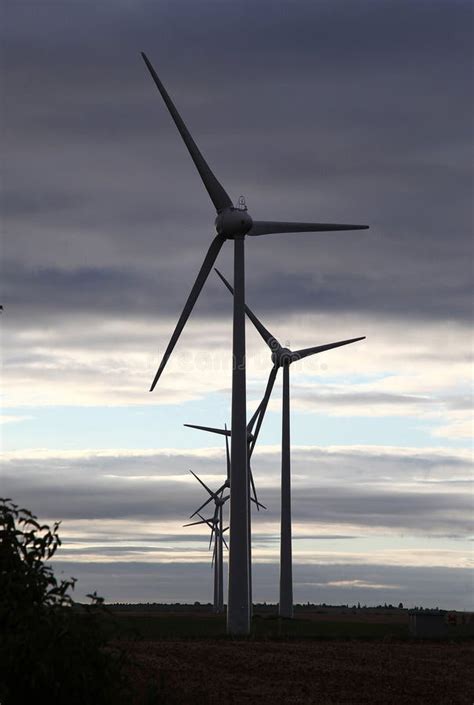 Wind turbine on the sunset stock photo. Image of alternative - 103999664