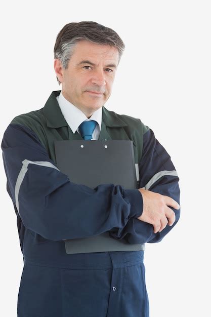 Premium Photo Confident Repairman With Clipboard