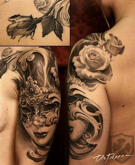 Some Tattoos That Are On The Back Of Someone S Shoulder And Arm With Roses