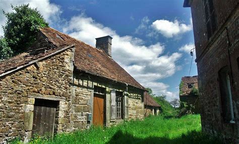 The Quiet Of An Abandoned Farm In Normandy Awaiting Restoration