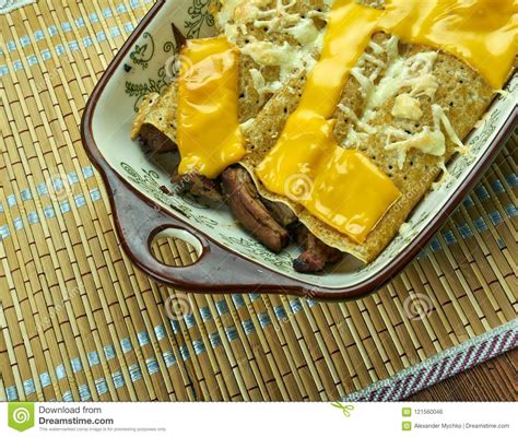 Pork Chili Verde Enchiladas Stock Photo - Image of cheese, rustic ...