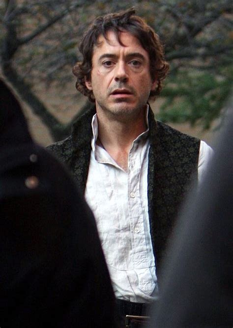 Robert Downey Jr as Sherlock Holmes