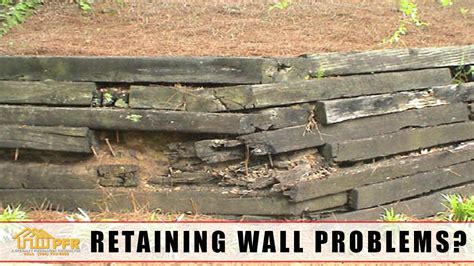 LANDSCAPE TIMBER RETAINING WALL REPAIR 704 787 6972 CHARLOTTE NC