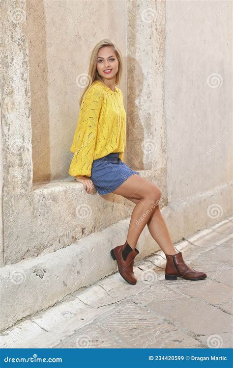 Beautiful Blonde Woman Posing On The Wall Stock Image Image Of Adult Face 234420599