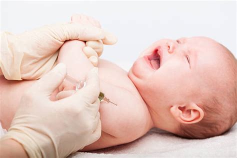 Best Vaccination Baby Crying Injecting Stock Photos, Pictures & Royalty ...