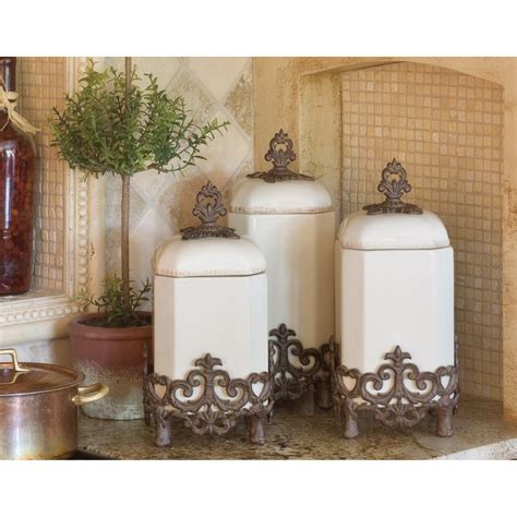 15 Cream And Bronze Provencial Canister With Fleur De Lis Metal Base