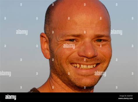 Portrait Of A Bald Headed Man Smiling Stock Photo Alamy