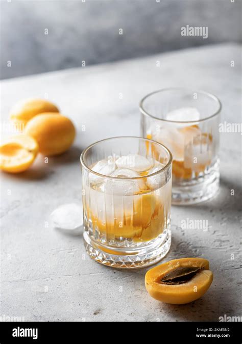 Apricot Iced Cocktails On Gray Background Refreshing Summer Alcoholic