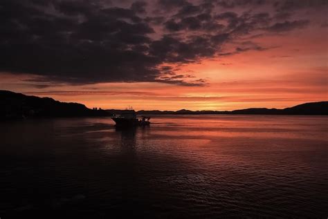 Premium Photo | Seascape after sunset in bergen norway ship in sea in ...