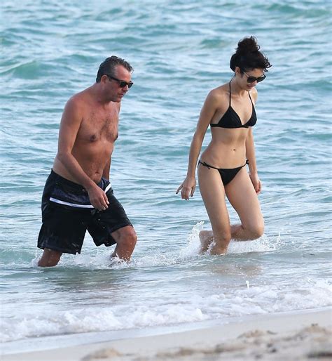 Olga Kurylenko Shows Off Her Hot Body Wearing Wet Black Bikini At The