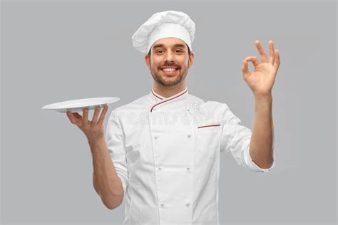 Happy Smiling Male Chef Holding Empty Plate Stock Photo Image Of Cook