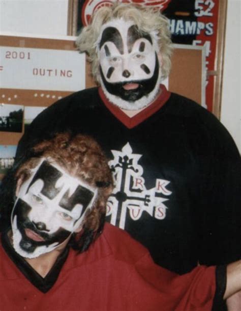 Two People With Clown Faces On Their Face