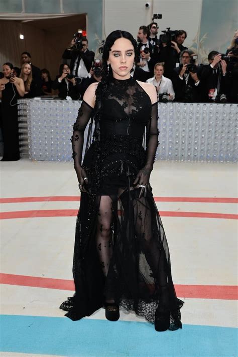 Billie Eilish Pairs A Lace Naked Dress With Sky High Platforms For The