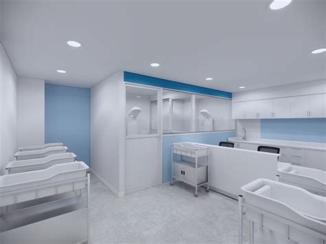 An Empty Hospital Room With Blue Walls And White Fixtures On The Wall