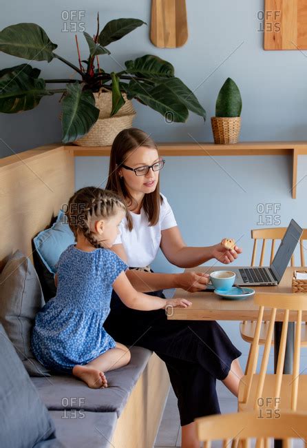 Mother and daughter cafe stock photos - OFFSET