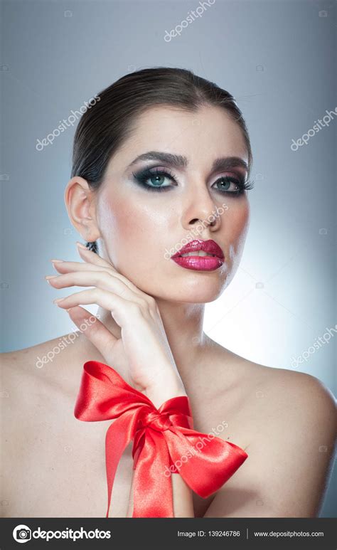 Hairstyle And Make Up Beautiful Female Art Portrait With Red Ribbon