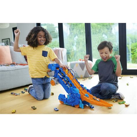 Мега транспортер Неймовірний Ті Рекс Hot Wheels HNG