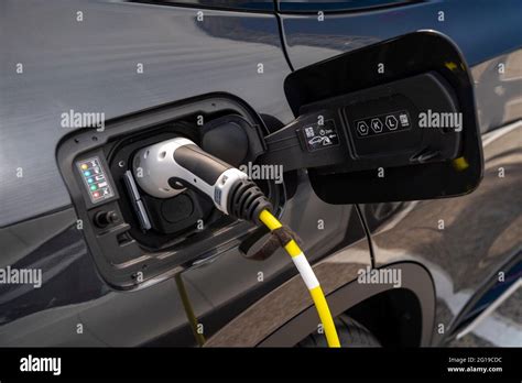 BMW electric car charging Stock Photo - Alamy