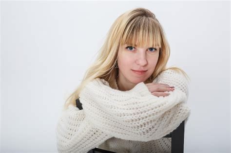 Premium Photo Close Up Portrait Of Blonde Girl Model In White Wool Sweater On White Background