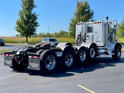 Used Kenworth T Quad Axle Day Cab Cummins Isx Dual Line Wet