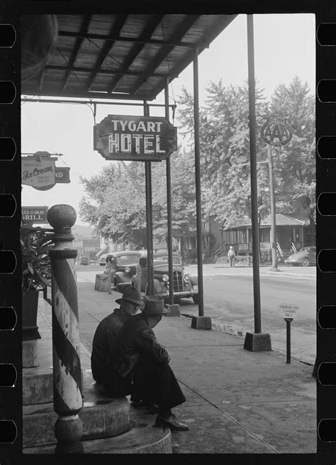 Two Men Outside Tygart Hotel – Elkins Depot Welcome Center