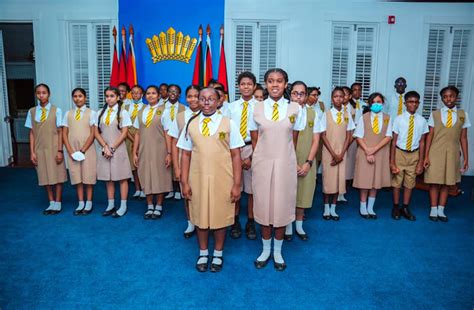 QC Choir entertains First Family at State House - Guyana Chronicle