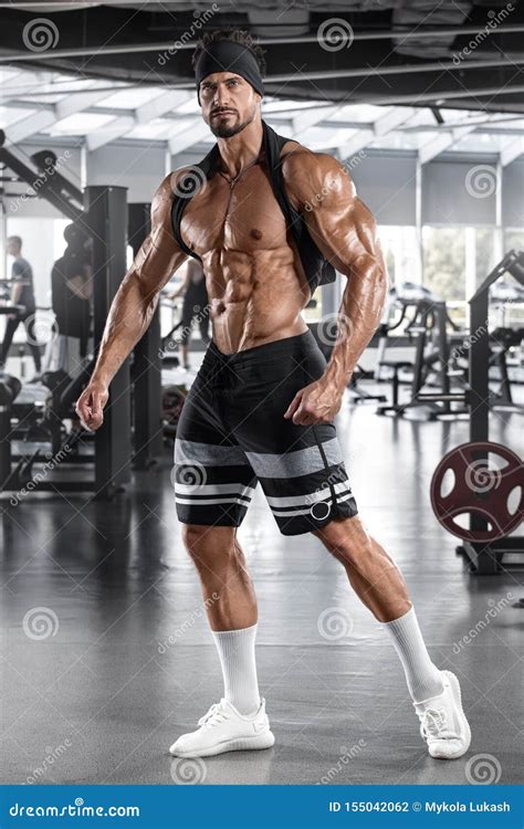 Muscular Man Workout In Gym Strong Male Naked Torso Abs Stock Photo