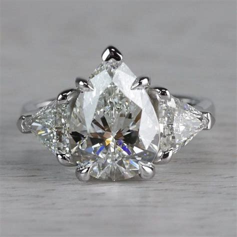 Luxurious 3 Carat Pear Shaped Diamond Ring Three Stone Engagement