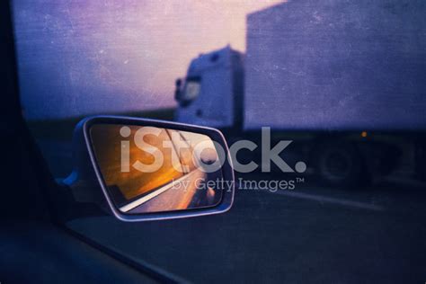 Rear View Mirror And Semi-Truck On The Highway Stock Photo | Royalty-Free | FreeImages