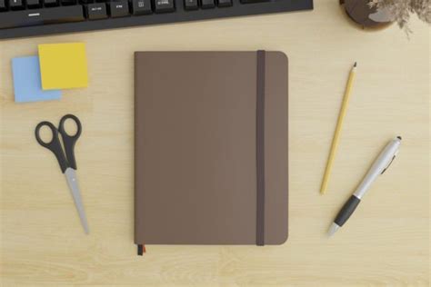 Brown Notebook Mockup On The Office Desk Graphic By Sandrofanton