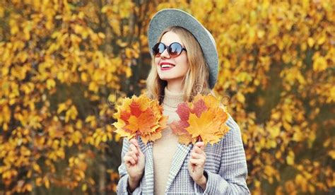 Autumn Portrait Beautiful Happy Smiling Woman With Yellow Maple Leaves