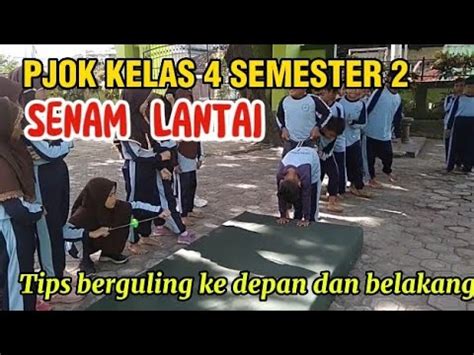 PJOK KELAS 4 SD AKTIVITAS SENAM LANTAI BERGULING KEDEPAN DAN BELAKANG