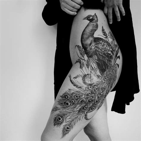 14 Beautiful Peacock Feather Tattoo Ideas For Women In 2024