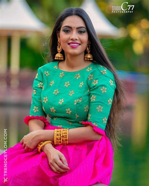 Serial Actress Pavithra Janani Stills In Green And Pink