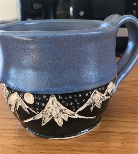 Black Underglaze Carved On Greenware Than Bisque Fired And Glazed With